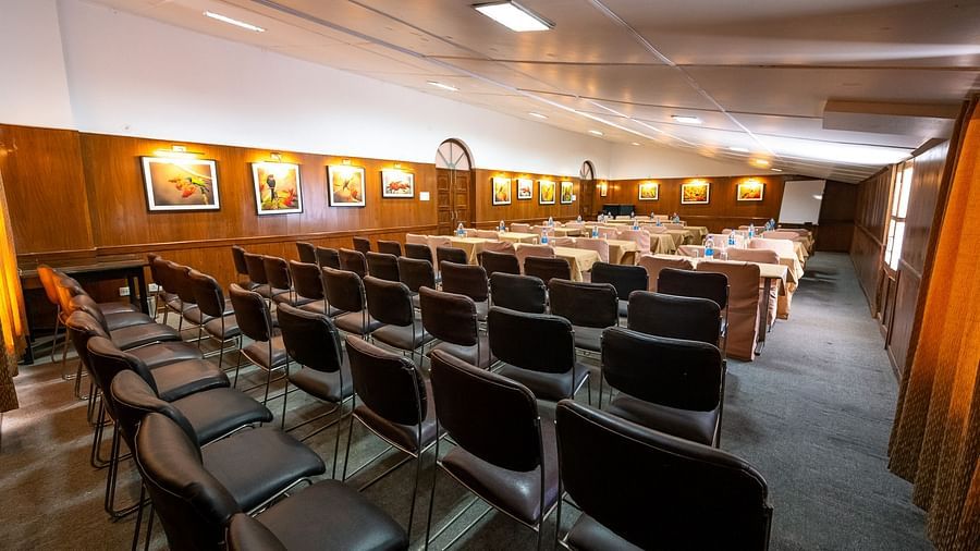 Row-wise seating arrangements with stylish interior design at The Pavilion, Nainital