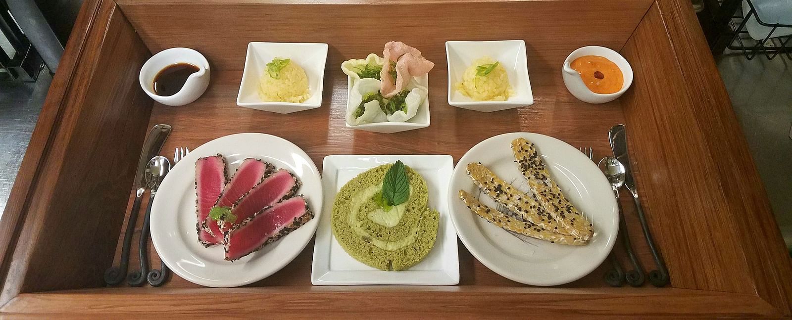 A Bento Box featuring various appetizers in a kitchen at Brewery Gulch Inn & Spa