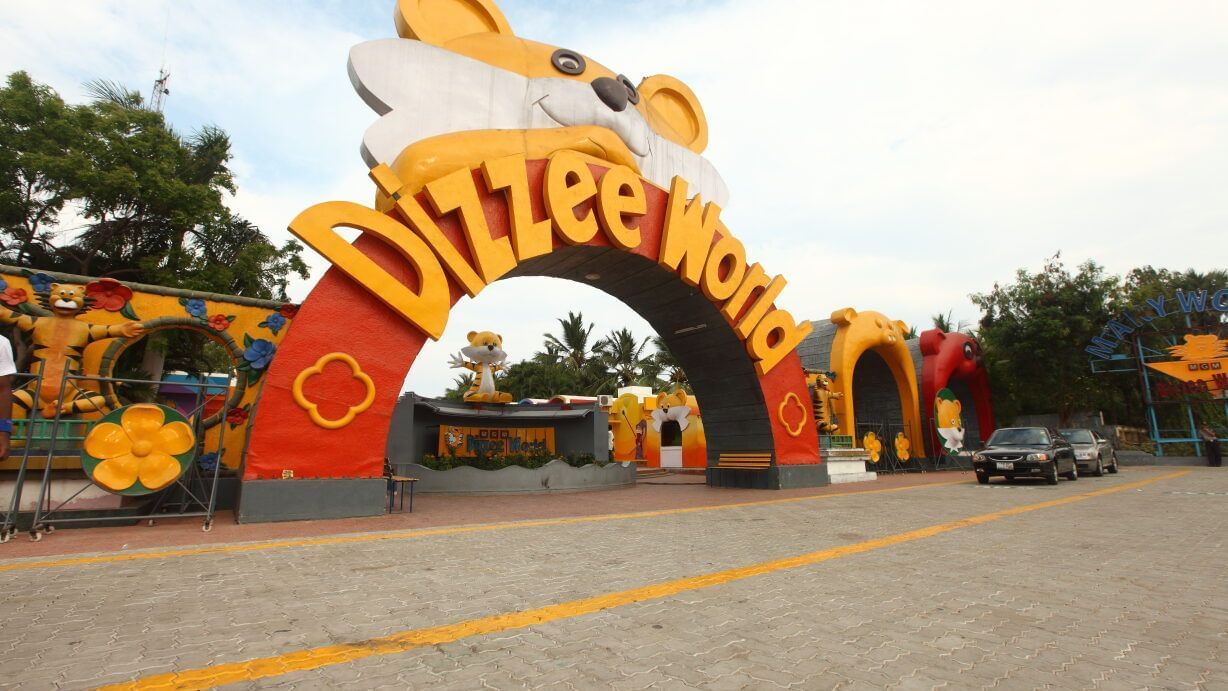 Entrance of MGM Dizzee World in Chennai under partially clouded sky