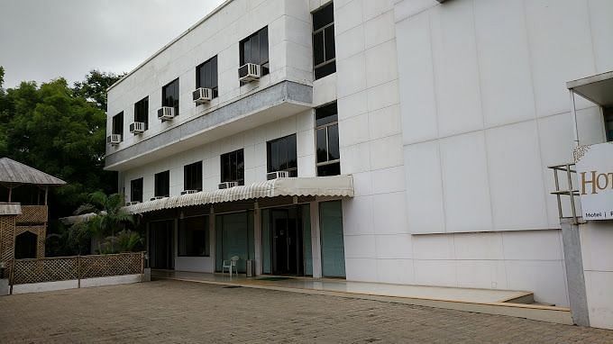 Facade image of VITS Select, Bharuch during a cloudy day.