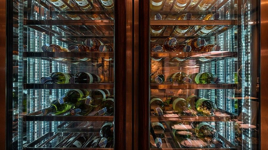 image of the wine cellar with a lot of bottles lying inside - Maikhao Dream Villa Resort & Spa, Phuket