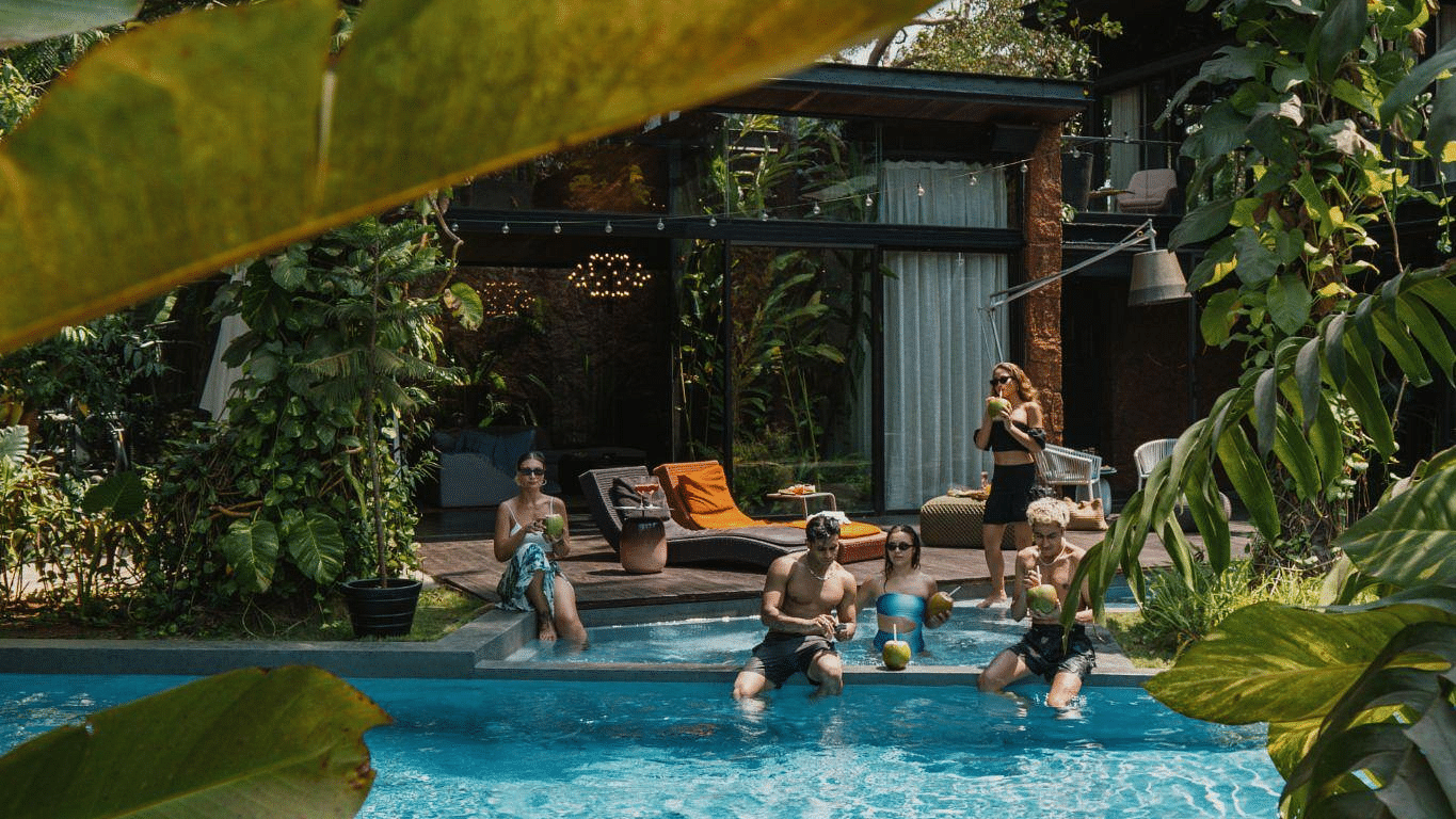 Picture featuring a few people by the pool