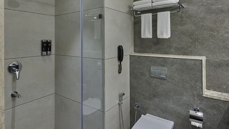 Shower area inside the suite at Grand Continent - A Sarovar Premiere Affiliate Hotel, Hosur