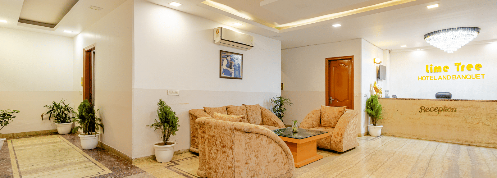 Another angle of sofas in the lobby of Lime Tree Hotels and Banquet Hall Near Huda Metro, Gurgaon