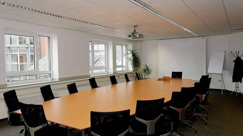 chairs around a table in a conference room