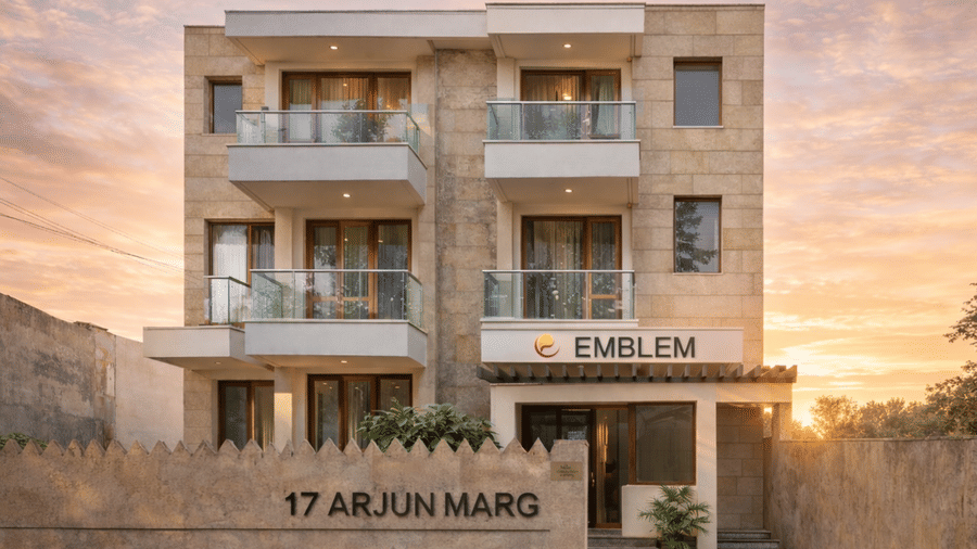 An exterior view of the building entrance and facade of EMBLEM - Arjun Marg, Golf Course Road, Gurgaon.