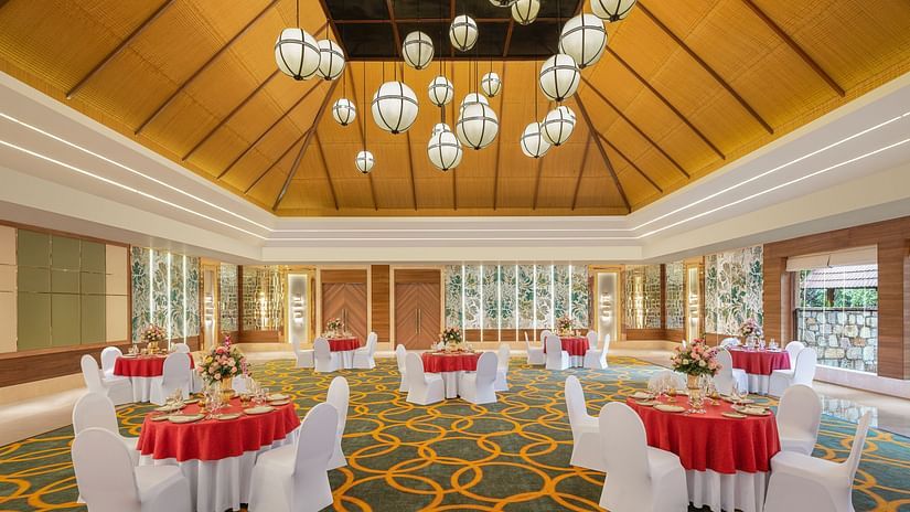 Banquet hall with chairs and tables at Ananta Spa And Resort, Pushkar
