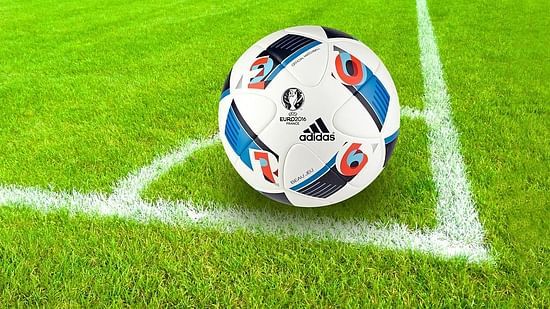 a football resting on a field