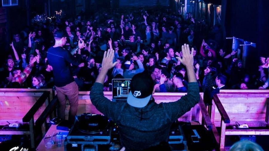 dj playing music at a party