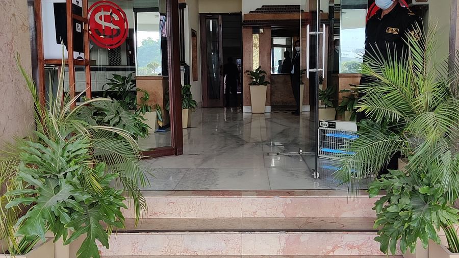 Close up shot of the entrance gates made of glass at Hotel Gold, Panipat.