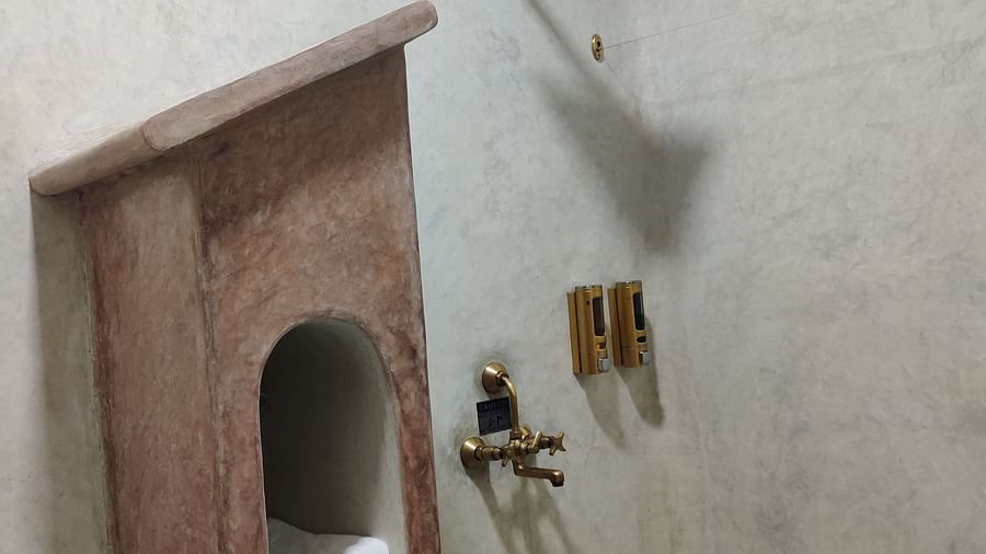 Marlin washroom towel holder shaped like a letter box and a premium looking shower head.
