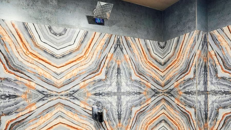 Vanity area with a shower facility in Suite at Hotel Regal Heaven, Pune