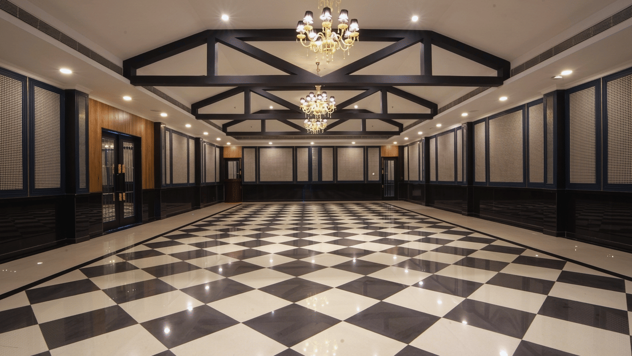 Grand convention hall with black and white checkered flooring at MAYFAIR Oasis Resort and Convention Jharsuguda