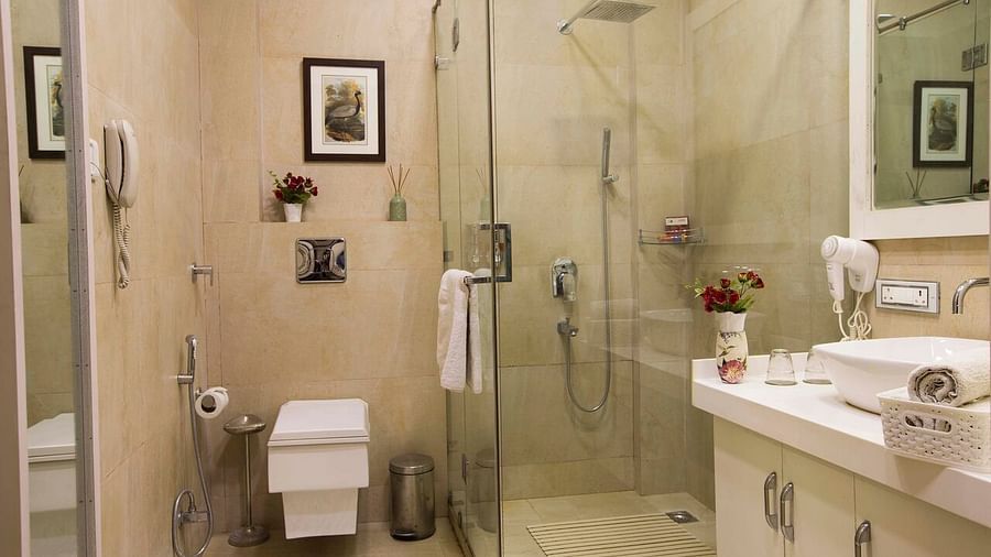 Image of interior of bathroom of a Hotel Room at Shaheen Bagh Resort Dehradun