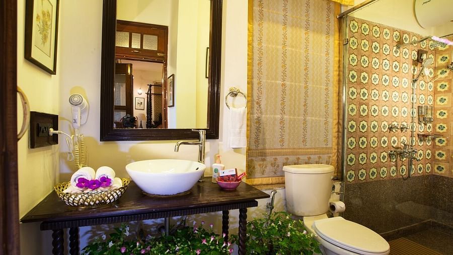 Image of interior of bathroom of a Hotel Room at Shaheen Bagh Resort Dehradun