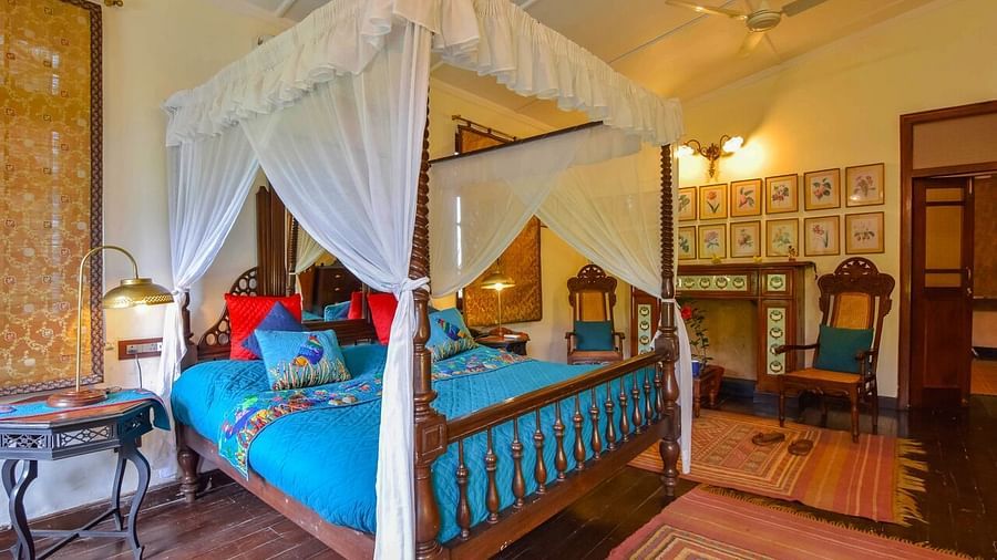 Image of interior of a Hotel Room with bed at Shaheen Bagh Resort Dehradun