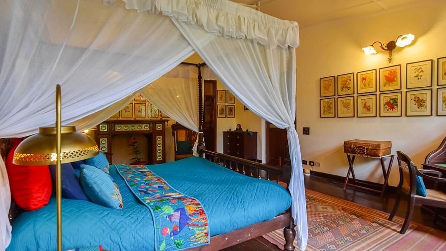 Image of interior of a Hotel Room with bed at Shaheen Bagh Resort Dehradun