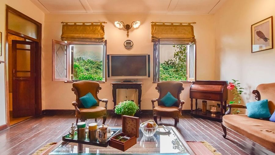 Image of interior of living area of a Hotel Room at Shaheen Bagh Resort Dehradun