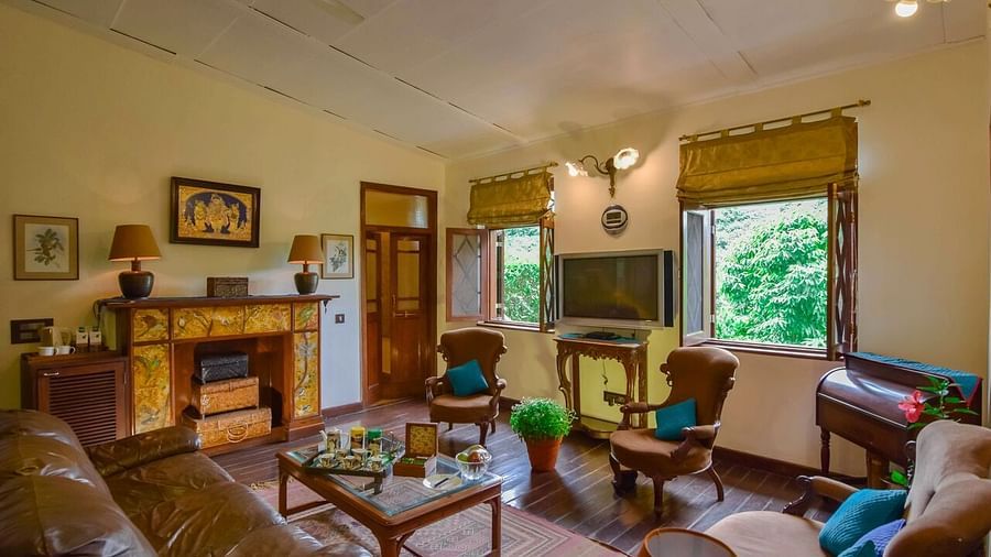 Image of interior of living area of a Hotel Room at Shaheen Bagh Resort Dehradun