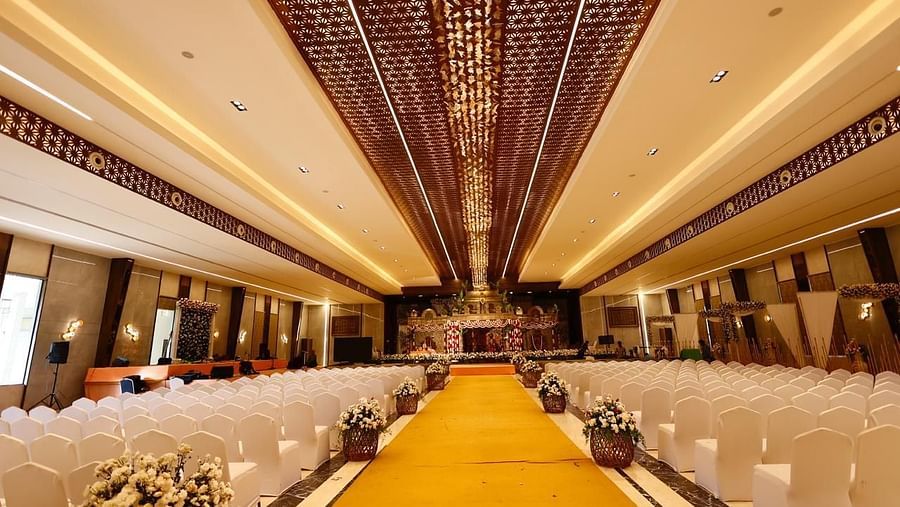 A spacious venue hall showcasing a blend of elegance and functionality.