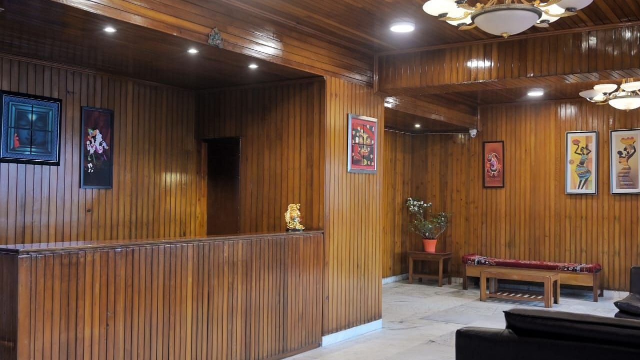 An image of the reception with the front desk and the seating area with sofa sets - Sumitel Chiminda, Pelling