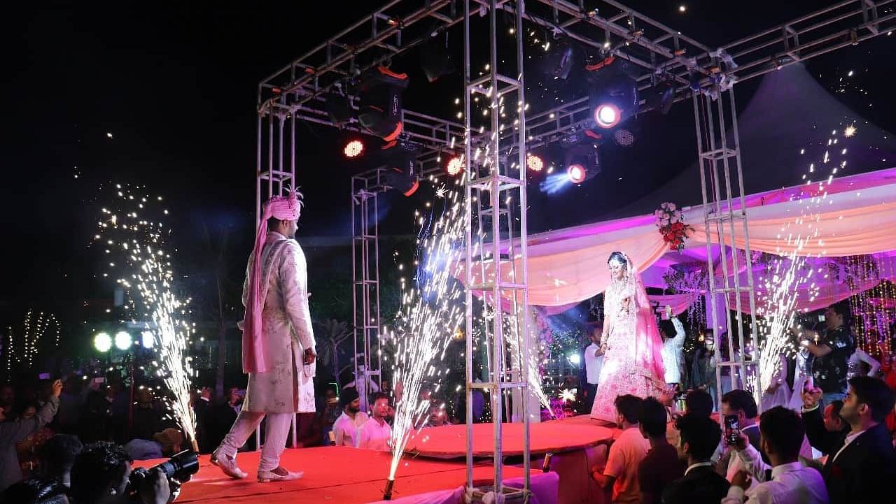 Entry of a groom at the mandap at night