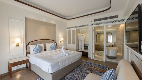 Full view shot of the luxurious bedroom at Ananta with ample of natural lighting at Bhagirathi by RDB Atishay.