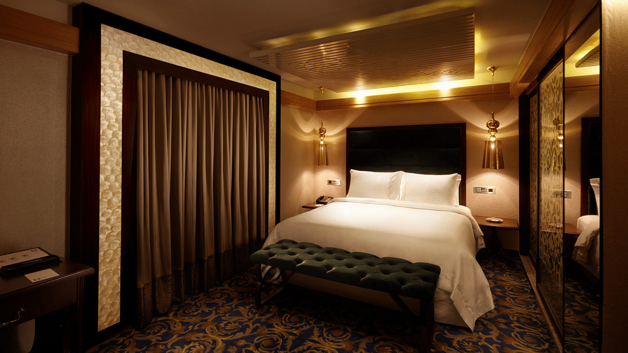 Hablis suite featuring a lush decor and commodious bed at Hablis Hotel, Chennai