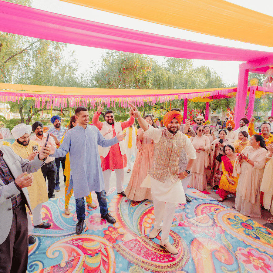 Lively tent scene with drapes and patterned flooring at Jaswinder and Ritika’s Umaid Palace wedding.