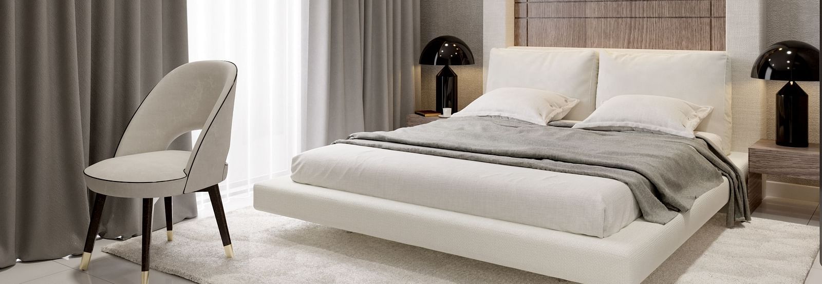 A queen size bed in a room at The Pelican Hotel, Accra.