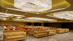 Theatre style seating arrangements inside the banquet hall with modern lights on the ceiling - VITS Bharat Nanded