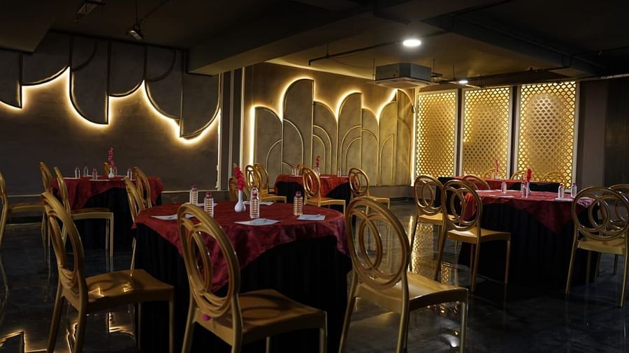An image of Utsav Banquet hall with several chairs and table set- Bamboo Saa Mulberry Resort, Pushkar