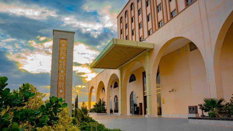 Golden hour shot of a hotel with landscaped garden - Serene Sarovar Premiere Hargeisa