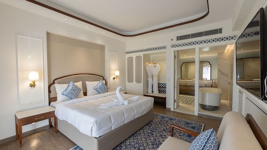 Full view shot of the luxurious bedroom at Ananta with ample of natural lighting at Bhagirathi by RDB Atishay.