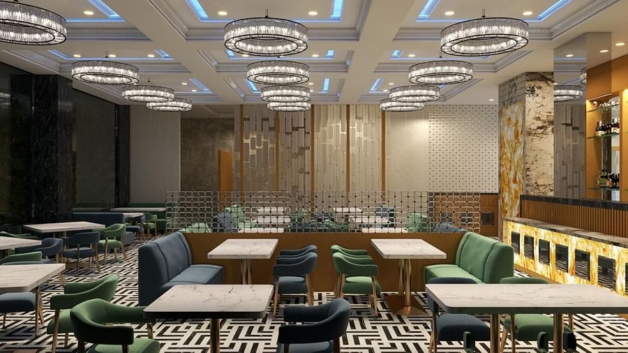 A stylish restaurant featuring chairs and tables, with round fancy lights at Hotel Mumbai House, Vashi