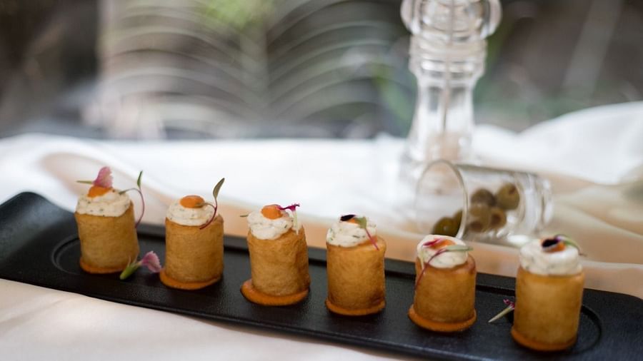 image of patata bravas served at the sevilla - The Claridges New Delhi
