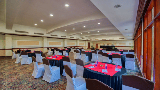 Mandap Hall at Clarks Khajuraho featuring a banquet hall with tables and chairs in theatre style set up.