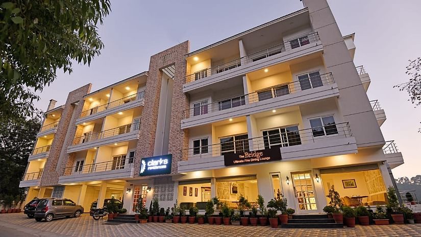 facade of Clarks Residences in Nainital as the sun goes down