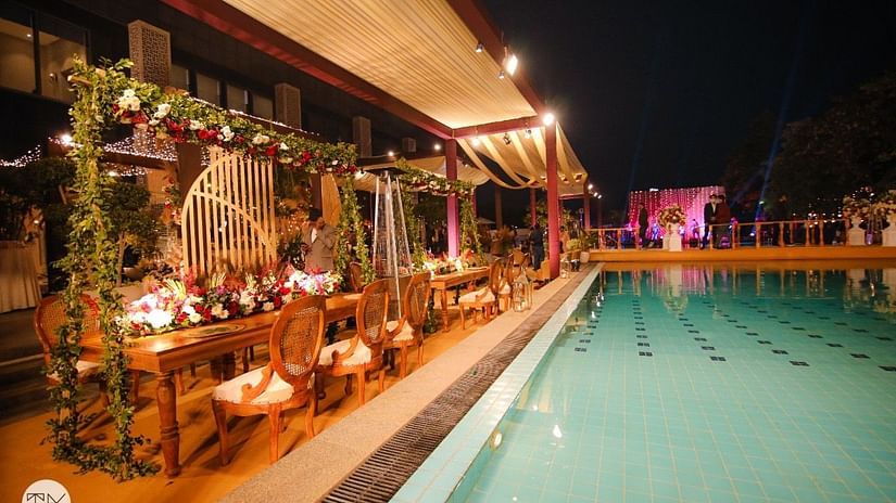 An overview of the seating arrangement next to the swimming pool - Karma Lakelands.