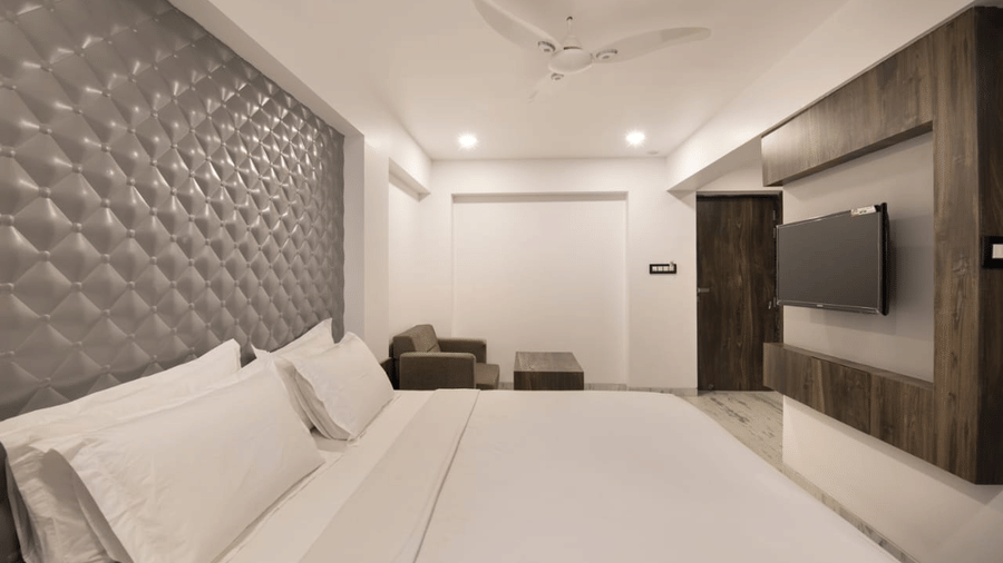 deluxe room side view with well furnished ambience and interior.