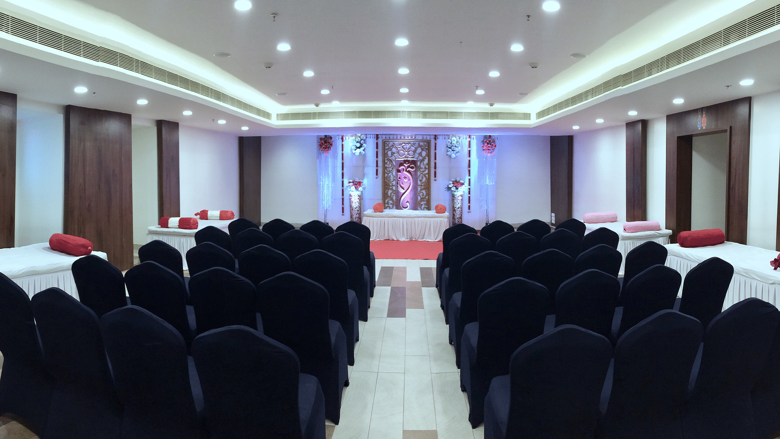 an image of the event hall filled with chairs at Zibe Salem by GRT Hotels