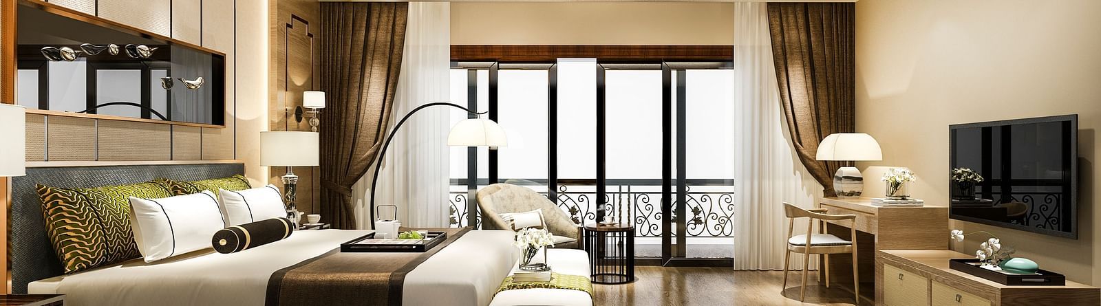A side of bed in a suite with a huge glass window, working table, and TV