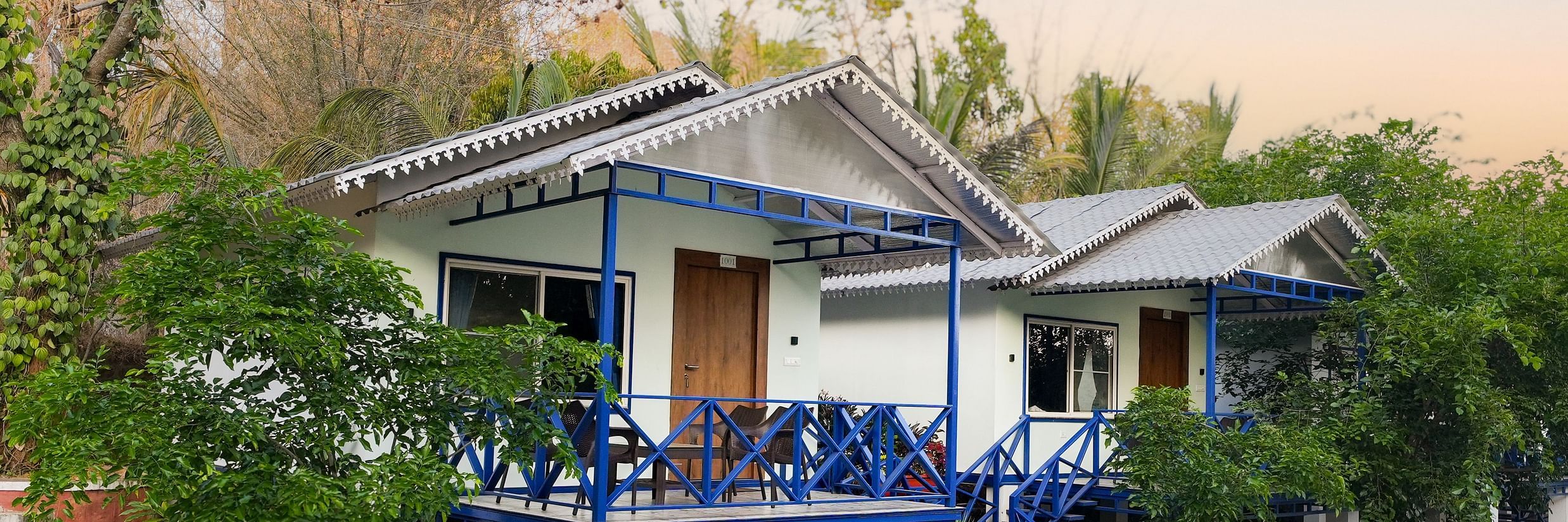 image of exterior of the property with two cottages side by side - MGM Whispering Wind's, Yelagiri