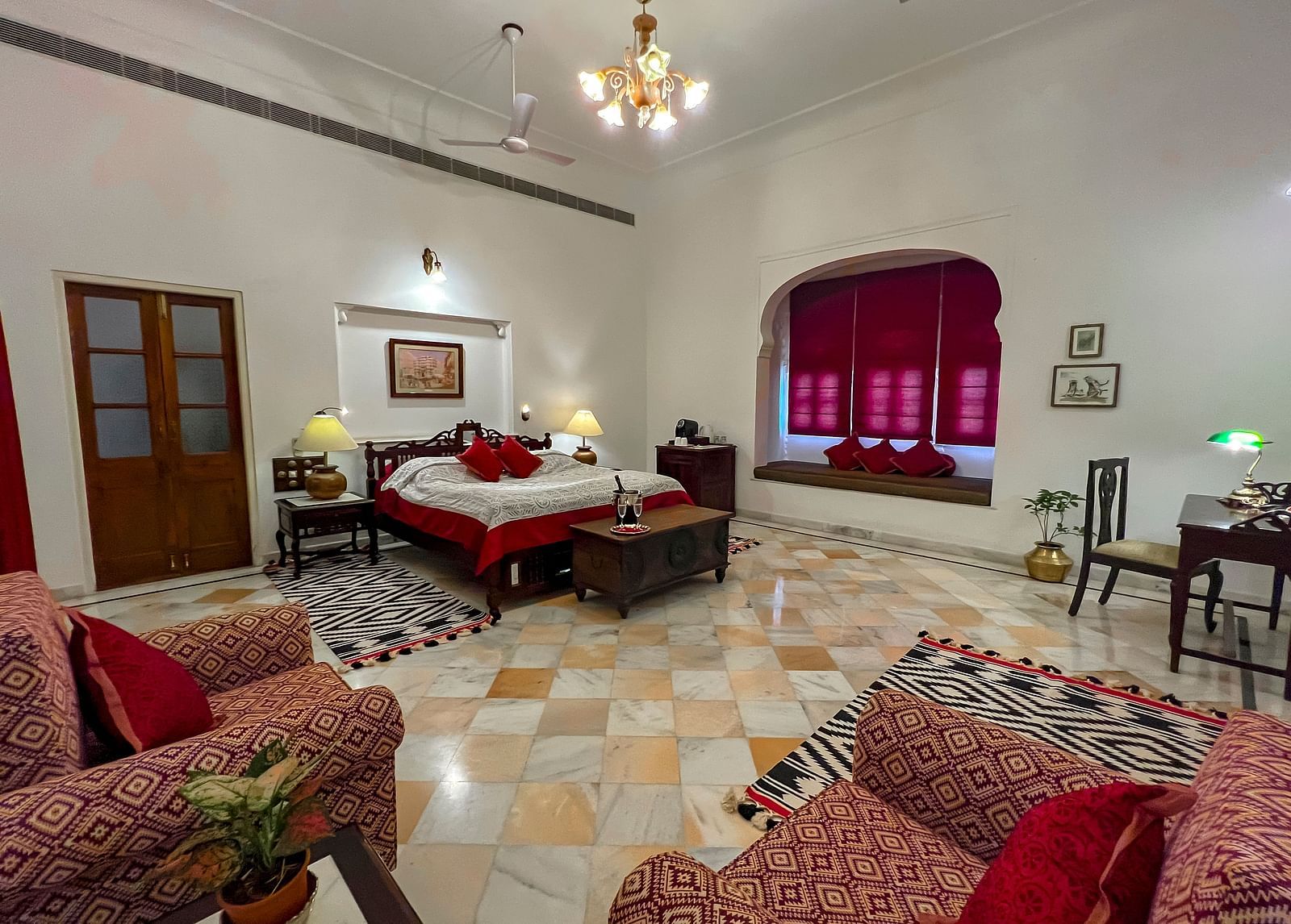 image of the Deluxe suite at Dev Shree, deogarh featuring a double bed in the room
