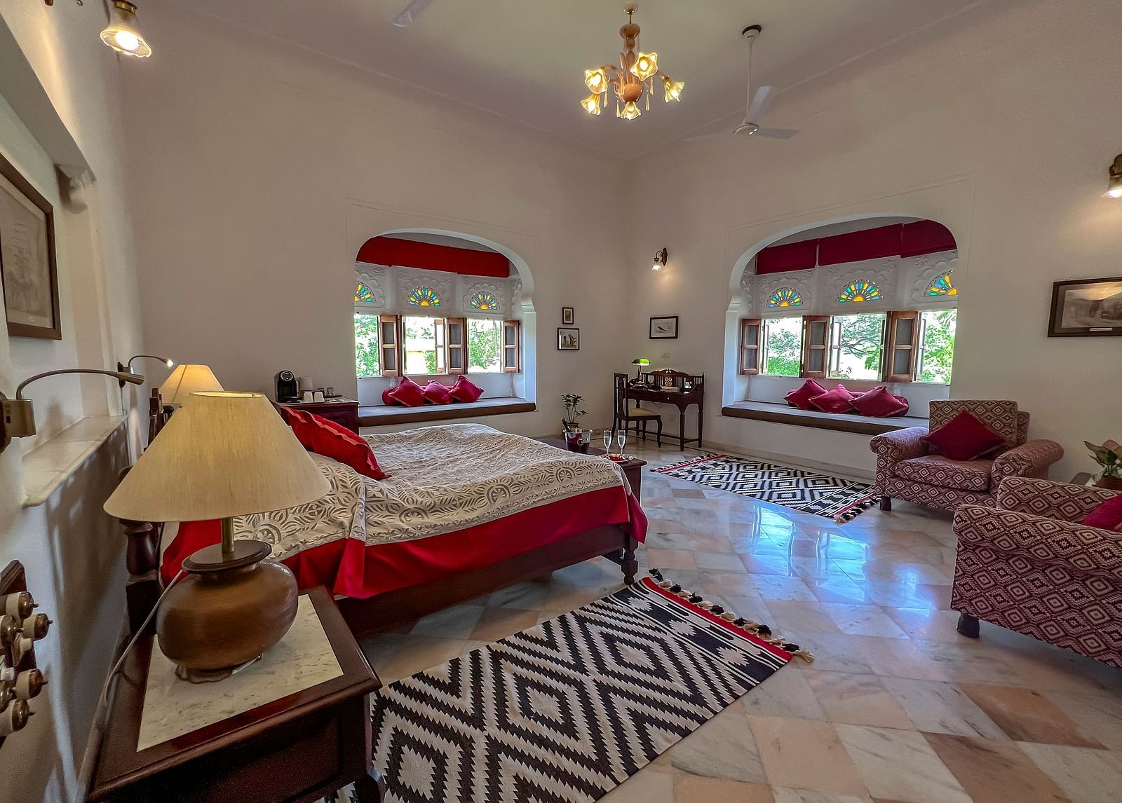 full view image of the Deluxe suite at Dev Shree, deogarh featuring a double bed