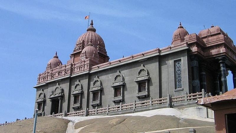 Facade view of Swami Vivekananda Rock Memorial with blue sky in the background.