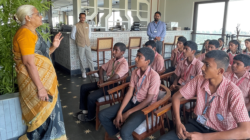 Image of a lady addressing the students