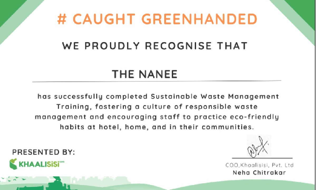 Certificate recognising the property with the Caught Greenhanded sustainability award displayed on a white and green background.