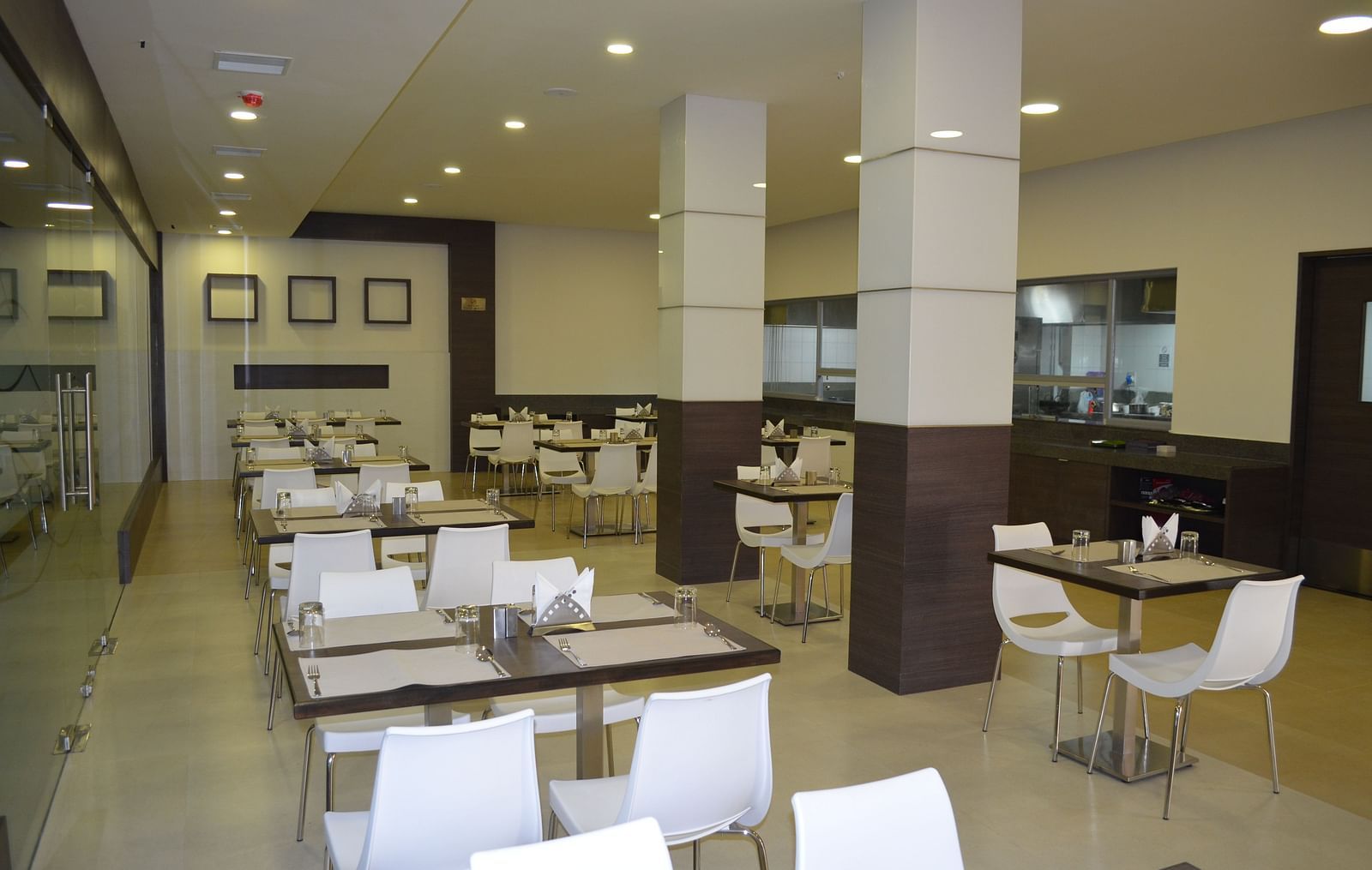 An image of a dining of a restaurant at Regency Tiruttani by GRT Hotels.
