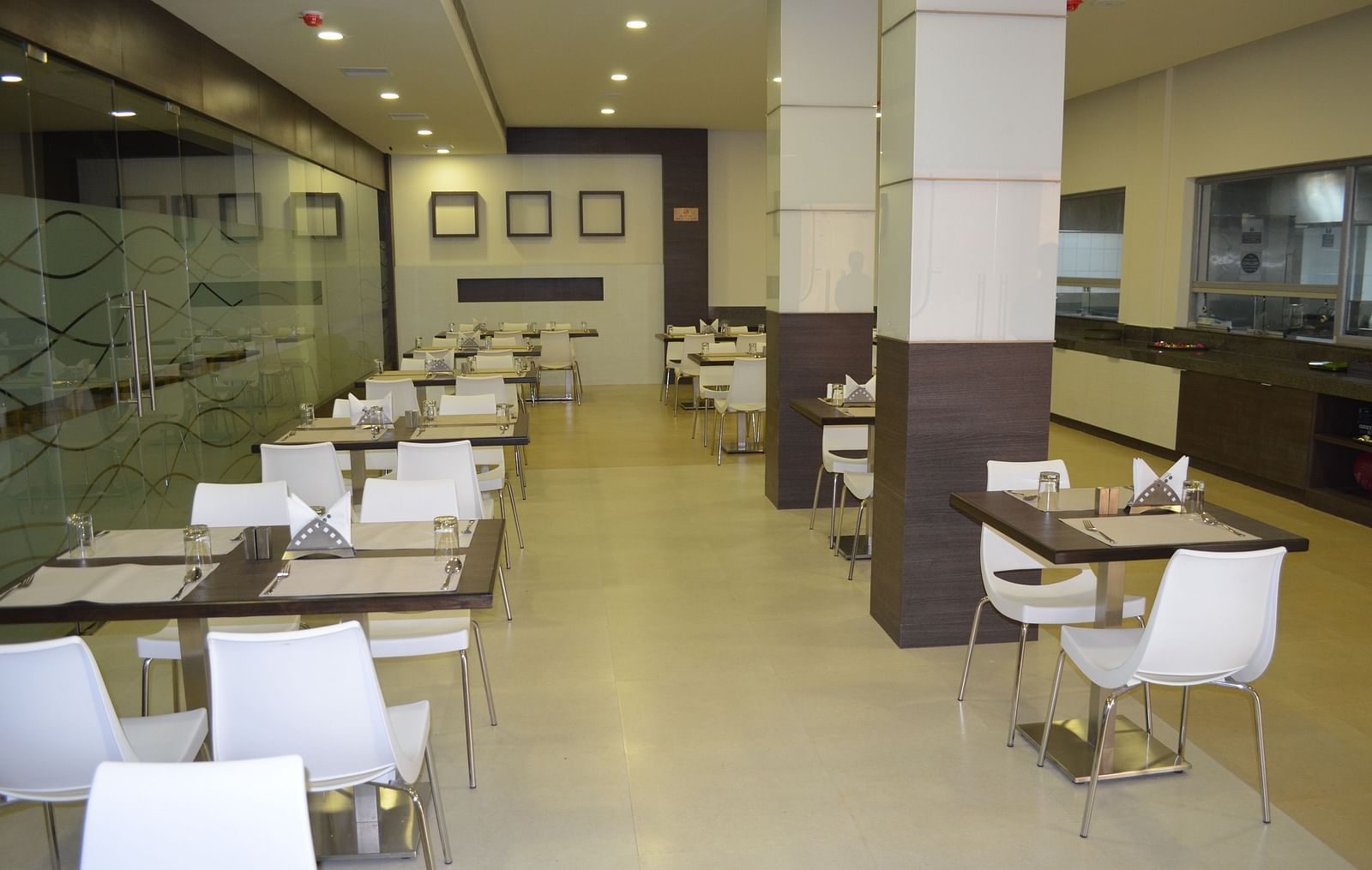 An image of a dining of Amudham Restaurant at Regency Tiruttani by GRT Hotels.